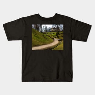 Countryside old wooden house on green hill Kids T-Shirt